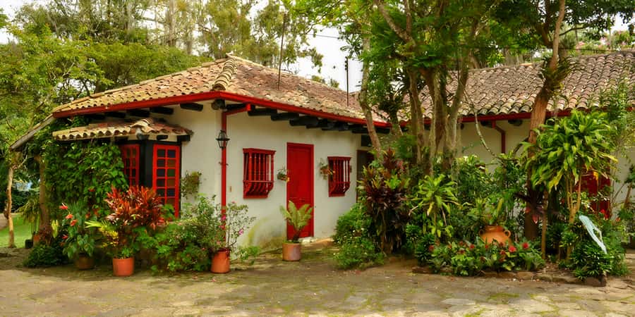 Bogotá: Guided Coffee Tour with Lunch, and Pickup & Drop-Off - Entering Hacienda Coloma: the finca gardens and why they matter